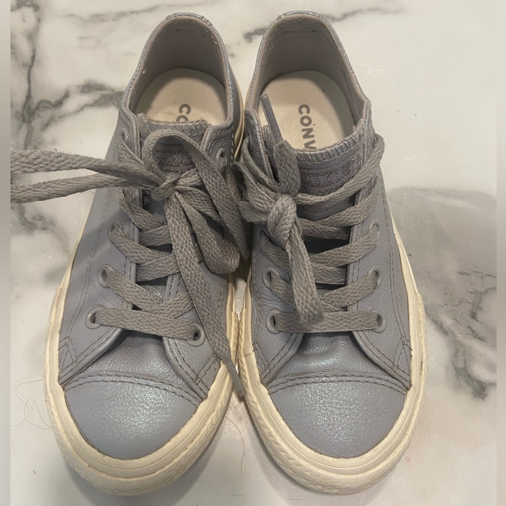 Powder blue/slate gray iridescent Converse.